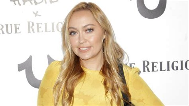 Why We Never Hear About Miley Cyrus' Older Sister, Brandi
